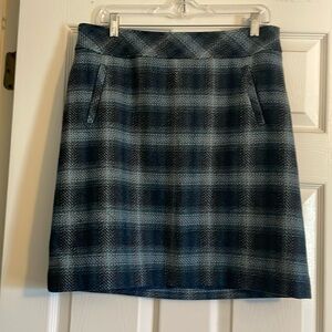 Blue and grey plaid knee length skirt.